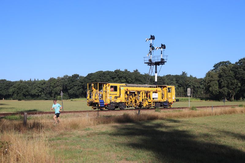 BAM Stopmachine met het fabrieksnummer 1214 en het UIC-nummer 99 84 942 8 702-7.